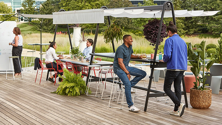 steelcase employees at outdoor table