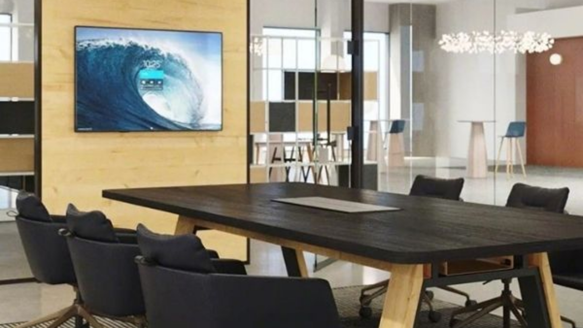 Image of a conference room with Steelcase office furniture and tech