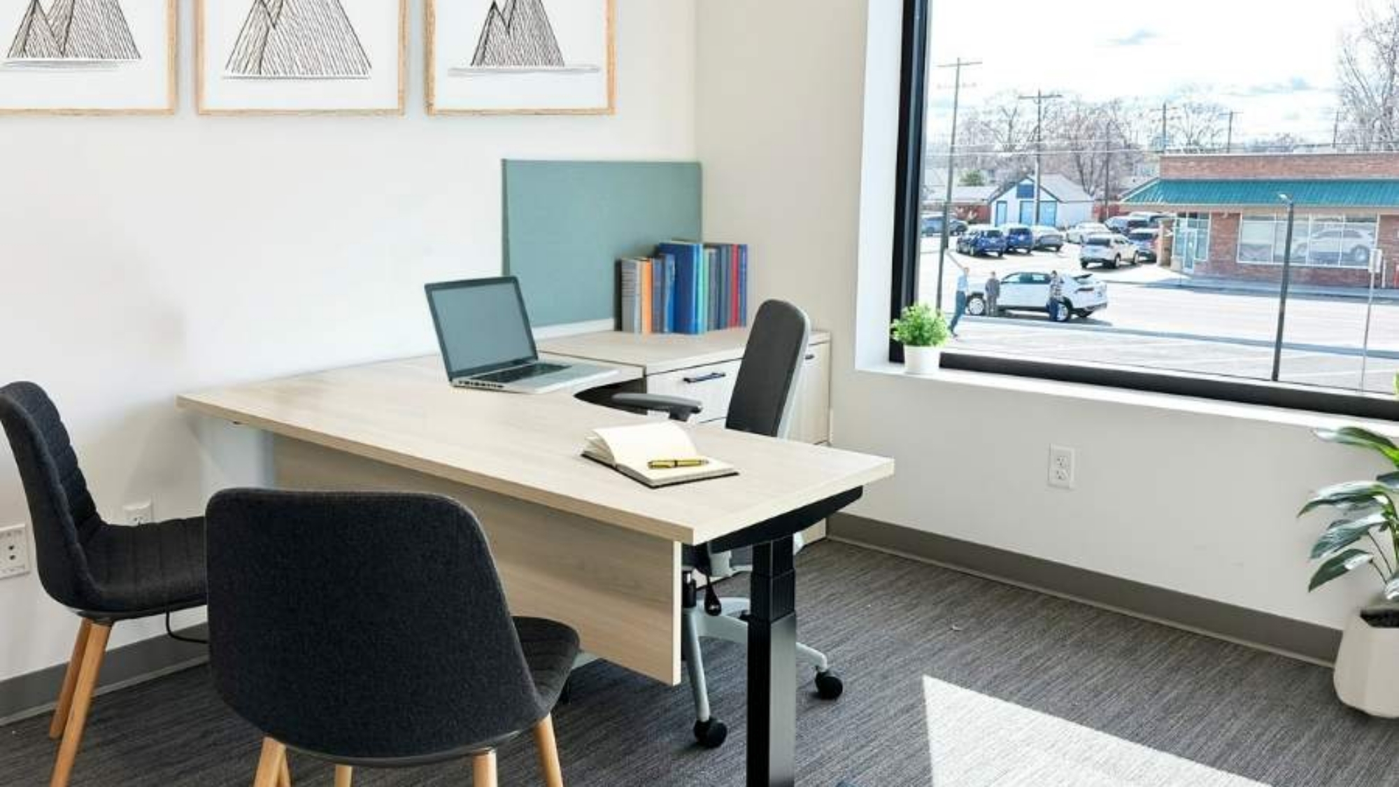 Private office with sit-stand desk and guest seating, Alliance Title & Escrow Nampa Idaho