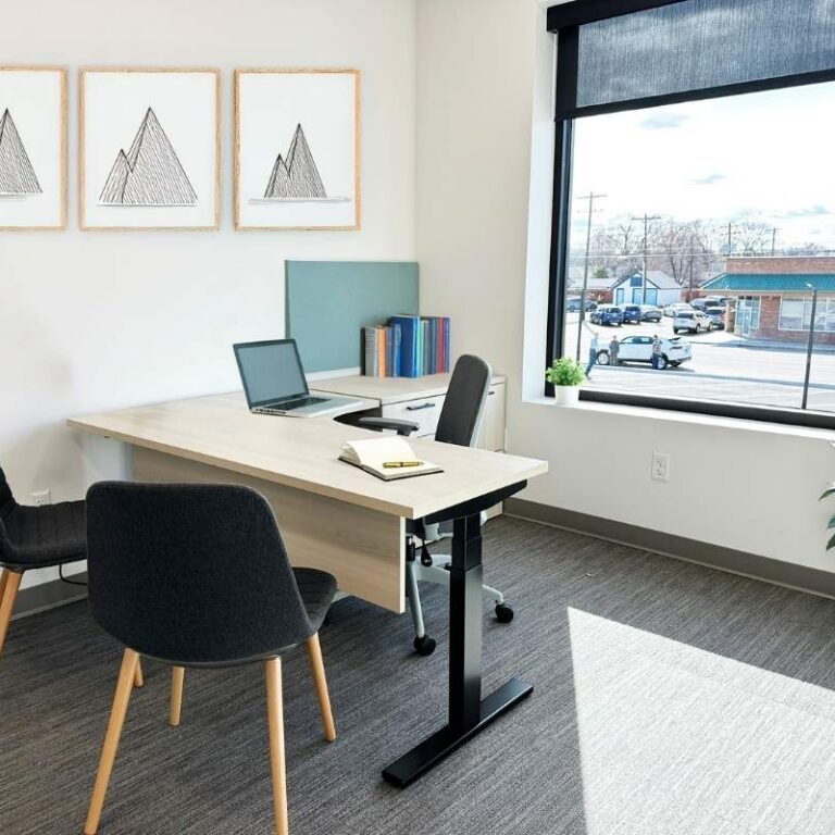 Private office with sit-stand desk and guest seating, Alliance Title & Escrow Nampa Idaho