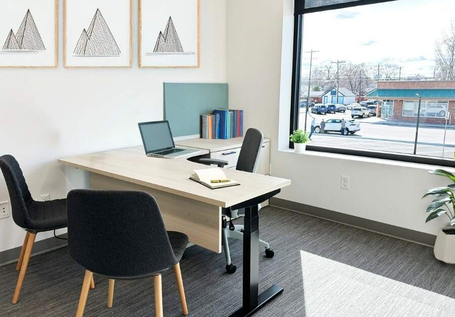 Private office with sit-stand desk and guest seating, Alliance Title & Escrow Nampa Idaho
