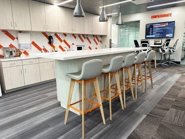 Bar-height seating with AV display in reception area, ISU Pharmacy, Pocatello, Idaho