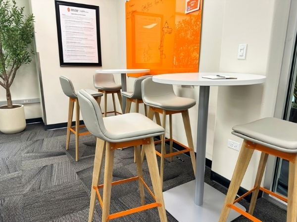 High-top study seating area with wood-frame chairs, ISU Pharmacy, Pocatello, Idaho