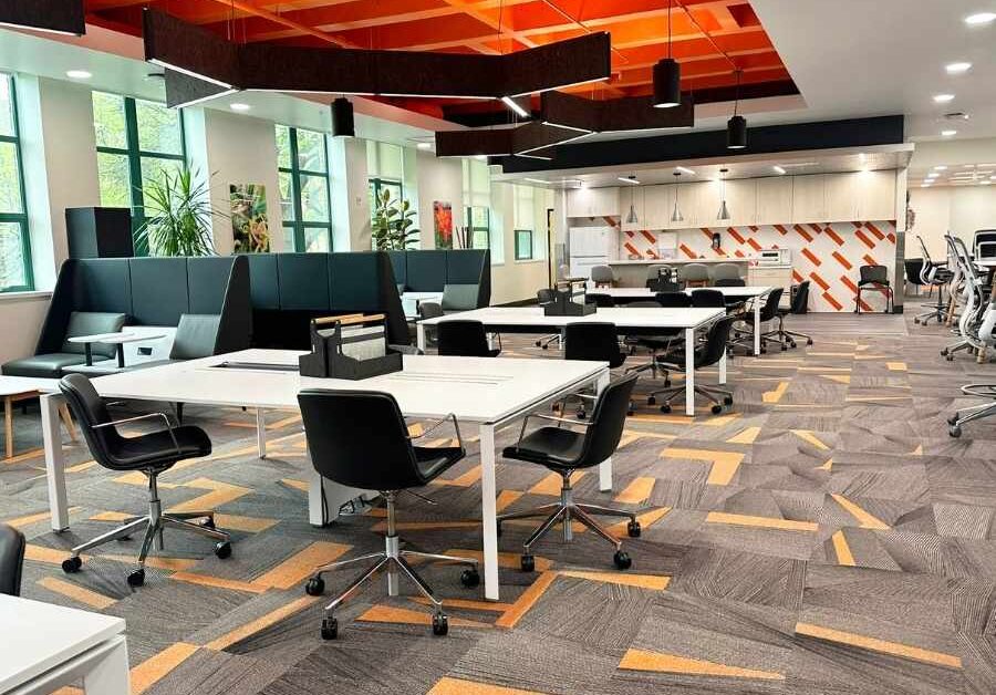 Open student study area with wood ceiling and flexible furniture, ISU Pharmacy, Pocatello, Idaho