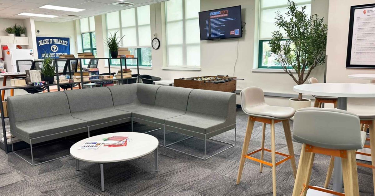 Student lounge with collaborative seating and bar-height tables, ISU Pharmacy, Pocatello, Idaho