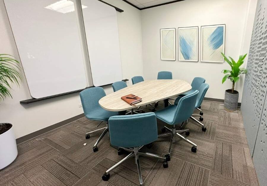 Conference room with decorative wall panel and blue seating, Idaho Department of Commerce, Boise, Idaho